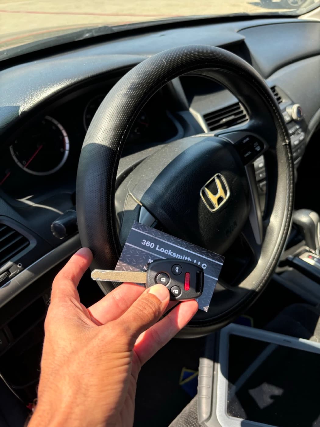 Honda remote key with 360 Locksmith LLC business card